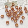Macro view of handmade pink matte glass rose beads with golden floral stamens for DIY jewelry - Dark Pink Cherry Blossom Style (1#)