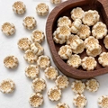 Macro detail of cream white flower Czech glass beads with golden trim for DIY jewelry - 1 Piece / Cream Gold