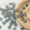 Macro shot of grey-blue star-shaped Czech glass beads with hand-painted bronze accents - Gray Blue Star Style(9#)-1 Piece