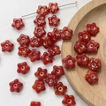 Close-up of vintage dark red star-shaped Czech glass beads with gold painted edges - Deep Red Star Style(11#)-1 Piece