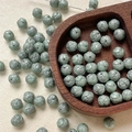 Detailed view of 8mm grey-green glass beads with silver rose embossing for DIY jewelry - Gray Green Silver Swirl (15#)
