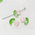 Detailed macro shot of translucent tulip glass beads for DIY jewelry making accessories - Pink 1 Set (Flower Bud + Leaf)