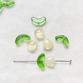Detailed view of DIY tulip glass beads with green leaf and creamy yellow petal charms - Milk Yellow 1 Set (Flower Bud + Leaf)