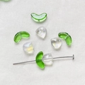 Detailed view of DIY glass tulip flower beads and green curved beads for jewelry making - Aurora White 1 Set (Flower Bud + Leaf)