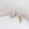 Close-up of 925 silver oval imitation pearl earrings with elegant gold-rimmed edges - Oval Simple Style (4#)