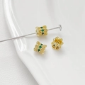Macro shot of 18K gold-plated spacer beads with green zircons for jewelry making - Style 1 18K Gold Cylinder