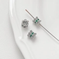 Macro shot of silver spacer beads with cat and floral shapes for DIY jewelry making - Style 2 Platinum Color Hollow Flower