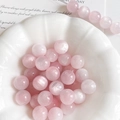 Detalle de cuentas de resina de ojo de gato rosa de 10mm en un cuenco para joyería DIY - 10mm (10 Piezas/Paquete) / Rosa