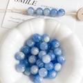 Primer plano de cuentas de resina ojo de gato azul de 10mm en un cuenco para joyería DIY - 10mm (10 Piezas/Paquete) / Azul marino
