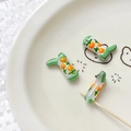 Macro detail of boot-shaped glass beads with hand-painted orange patterns for DIY jewelry - Tangerine (7#) / 1 Piece