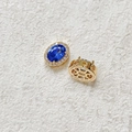 Macro detail of 18k gold plated sapphire blue oval charm with diamond halo and hollow back - Blue (18K Gold)