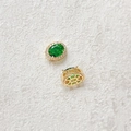 Macro shot of 18k gold plated oval green gemstone spacer bead with zircon detail - Green (18K Gold)