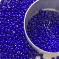 Macro shot of 4mm dark blue glass seed beads for DIY jewelry making and craft projects - 10 g / Dark Blue