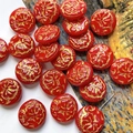 Macro shot of vintage red beads with gold peony floral relief for DIY jewelry making - 1 Piece Pack / Red