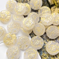 Macro shot of vintage floral engraved beads with gold accents for DIY jewelry making - 1 Piece Pack / White