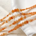 Detalle macro de cuentas de cuarzo rosa con forma de estrella para hacer joyería DIY - 7# Aventurina Naranja