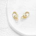 Macro shot of 18k gold plated heart lobster clasps for DIY jewelry making on ceramic - Smooth 3D Style / Style 1# 18k Gold