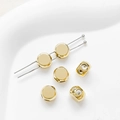 Close-up of polished 18k gold-plated stopper beads for DIY jewelry making and bracelet crafts - 1 Piece / 18K Gold