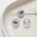 Macro shot of translucent agate beads with blue enamel auspicious cloud patterns and gold trim - Ruyi Style (1#) / Single Piece / White and Blue