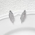 Detailed view of silver liquid irregular earring studs with marquise zircon and DIY loop - White Gold