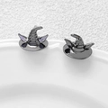 Close-up of wizard hat pins in gun-black finish with purple ear details for DIY jewelry - Gunmetal