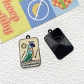 Detailed view of The Magician tarot parrot pendant with colorful enamel and metal texture - The Magician