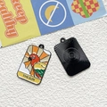Macro detail of alloy parrot sun tarot charms with engraved sunburst on the back side - The Sun
