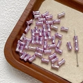 Dettaglio ravvicinato di perline rosa-viola a forma di bambù per gioielli fai-da-te - Taglia 6 / 1 Pezzo / Viola