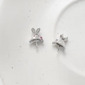 Macro shot of 18K gold plated bunny earring findings with zircons for DIY jewelry - Hat Rabbit / White Gold