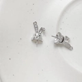 Macro detail of silver rabbit jewelry finding with sparkling stones for DIY pearls - Rabbit Head Style / White Gold