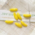 Detailed view of yellow mini banana glass beads on linen for DIY jewelry crafting - 1# (Bright Yellow)