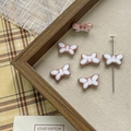 Close-up of Czech butterfly glass beads for DIY jewelry making with metallic trim - 1# Butterfly Bead