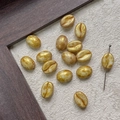 Macro shot of coffee bean shaped Czech glass beads with gold trim and marble texture - Gold Marble (3#)
