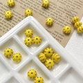 Macro detail of yellow pumpkin Czech glass beads with vintage textured stripes for DIY jewelry - Yellow Pumpkin Style (1#)