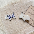 Detail of hand-painted ceramic dalmatian dog shaped beads with dual holes for DIY jewelry - Style 3