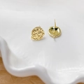 Detailed view of 18k gold plated round stud earrings with irregular hammered texture - 18K Gold Plated