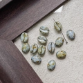 Macro shot of coffee bean glass beads with marble texture for DIY jewelry making - Grey Blue Textured (25#)