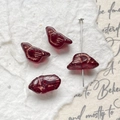 Macro detail of bird-shaped beads with gold etching for DIY jewelry making - Translucent Dark Red Bird (9#)