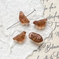 Macro view of four amber glass bird beads with intricate handmade textures for DIY jewelry - Transparent Amber Bird (13#)
