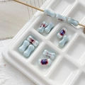 Macro detail of handmade light blue dumbbell ceramic beads with artistic kiln glaze for DIY jewelry - 7# Light Blue Kiln Changed Style (D5347) / 1 Piece