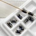 Macro detail of deep blue marble effect ceramic bone beads for DIY jewelry making - 11# Blue White Marble Style (D5347) / 1 Piece