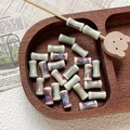 Macro view of hand-painted bamboo joint ceramic beads with ice crack glaze for DIY jewelry - Light Bean Green Ice Crackle Style (2#) / 1 Piece