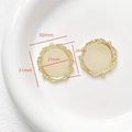 Macro view of 18k gold plated baroque style oval pendant frames with ornate floral relief - Baroque Carved Style (5#)