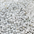Macro shot of 4mm cream texture glass beads with marble patterns and gold speckles - 10g Pack / Color 5 (Gray and Black Pattern)