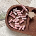 Close-up of pink gradient bamboo-shaped ceramic beads for DIY jewelry making in a wooden tray - Pink White Gradient Glossy Style (8#) / 1 Piece