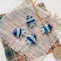 Detailed view of hand-painted ceramic tropical fish beads for DIY jewelry on linen - 9# (Multicolor Wave Pattern)
