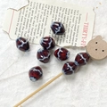 Dettaglio macro di perle di ceramica marrone rossiccio con trama a rete per gioielli fai-da-te - Stile a Rete Marrone Rosso Scuro (11#)