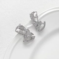 Macro detail of silver plated carousel horse pendants with sparkling cubic zirconia - Hollow Pegasus Style / White Gold