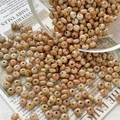 Macro shot of discoid Czech glass beads with marble texture for DIY jewelry making - Style 1 / 10 Pieces Pack