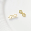 Detail of gold-plated round glasses ear studs on white minimalist ceramic tray - 18K Gold